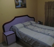 Kamar Tidur 3 Hotel BackPacker Inn