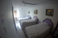 Kamar Tidur Hotel BackPacker Inn