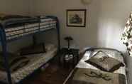 Phòng ngủ 7 Longmuir's Hidden Cove Cottage Resort