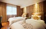 Kamar Tidur 3 Chengdu Taiji Business Hotel