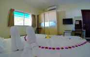 ห้องนอน 6 Luau Beach Inn
