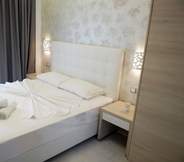 Kamar Tidur 6 Litsa Apartments