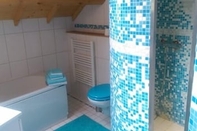 Phòng tắm bên trong Le Chalet Champenois