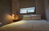 Kamar Tidur 4 Grim Garden Guest House