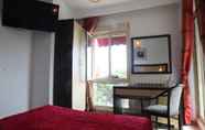 Kamar Tidur 6 Space Telemly Hotel