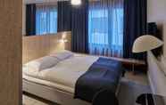 Phòng ngủ 2 Zander K Hotel