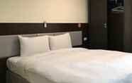 Kamar Tidur 5 Big Bear Hotel
