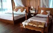 Kamar Tidur 7 Golden Island Cottages Nampan Hotel