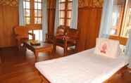 Kamar Tidur 6 Golden Island Cottages Nampan Hotel