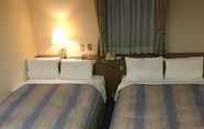 Bedroom 3 Hotel Crown Hills Matsuyama