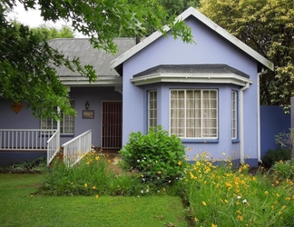 Exterior 2 Lilac Lodge Purple House