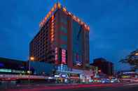 Exterior Vienna International Hotel Guangzhou Panyu City Bridge Center International