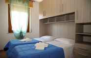 Kamar Tidur 5 Sea view and ground floor Apartments le Dune