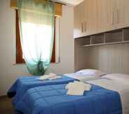 Kamar Tidur 5 Sea view and ground floor Apartments le Dune