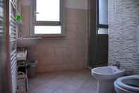 Toilet Kamar Sea view and ground floor Apartments le Dune