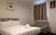 Kamar Tidur 4 CityLights Hotel