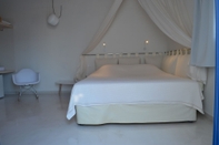 Kamar Tidur Faros Resort Hotel