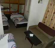 Kamar Tidur 7 Om Tara Guest House