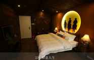 Bedroom 4 Guangzhou Yujian Hotel