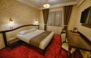 ห้องนอน 6 Magus Hotel