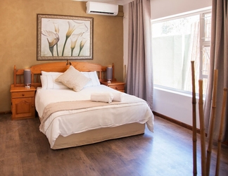 Kamar Tidur 2 Feather Nest Guest House