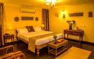 ห้องนอน 3 Purple Hotels Resorts