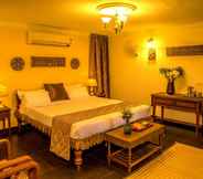 Kamar Tidur 3 Purple Hotels Resorts