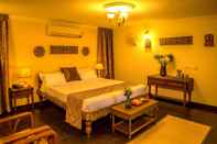 Kamar Tidur Purple Hotels Resorts