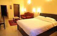 ห้องนอน 4 Purple Hotels Resorts