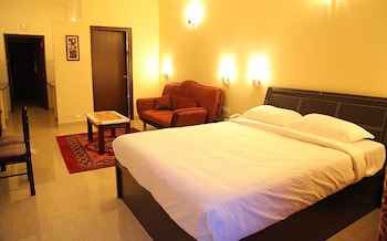 ห้องนอน 4 Purple Hotels Resorts