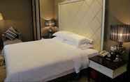 Kamar Tidur 4 Country Garden Phoenix Hotel Yunfu