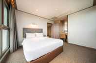 Kamar Tidur Sunrise Hotel Sungsan