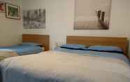 Kamar Tidur 4 Belfast City Central by BHR Apartments