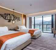 Bedroom 2 Holiday Inn Nanjing Xuanwu Lake, an IHG Hotel