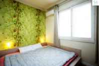 Bedroom Tiara Guesthouse - Hostel