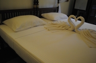 Kamar Tidur Wasantha Garden Hotel