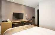 ห้องนอน 5 Jeju Slim Hotel