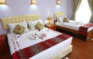 Kamar Tidur 3 The Floral Breeze Wun Zin Hotel