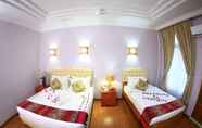 Kamar Tidur 4 The Floral Breeze Wun Zin Hotel