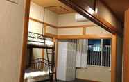 Bedroom 5 Guest House Umikaji - Hostel