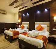 Bedroom 2 Hotel Amaltas International by Orion Hotels