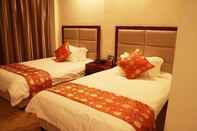 Kamar Tidur Shanghai Shuiting Holiday Hotel
