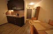 Kamar Tidur 4 Menada Sunny Beach Plaza Apartments