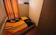 Kamar Tidur 2 Menada Sunny Beach Plaza Apartments