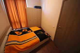 Kamar Tidur 4 Menada Sunny Beach Plaza Apartments