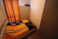 Kamar Tidur Menada Sunny Beach Plaza Apartments