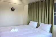 ห้องนอน Shin Sane Guesthouse