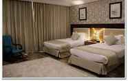 Bedroom 3 Rawda Suites Hotel