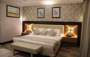 Bedroom 2 Rawda Suites Hotel
