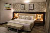 Bedroom Rawda Suites Hotel
